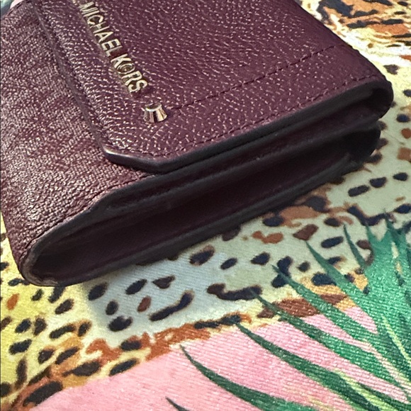 Michael Kors Plum Textured Wallet - Picture 4 of 11